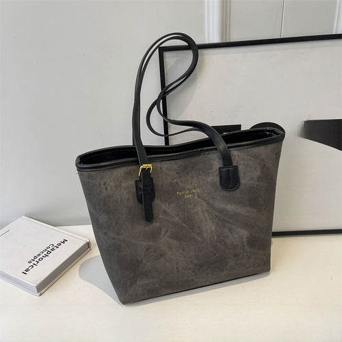Bolso tote de cuero sintético con estampado efecto mármol. Gran capacidad, cierre con cremallera y correa ajustable