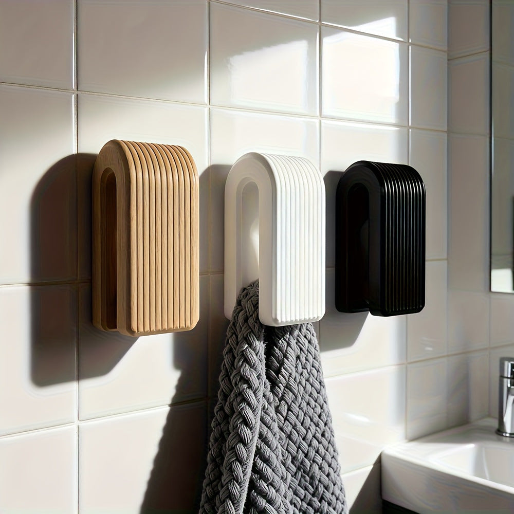 Ganchos 3D de pared con cierre por gravedad – organización inteligente sin taladro ni tornillos